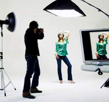 Woman shooting photos in a studio session